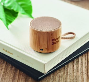 Logotrade promotional product image of: Round bamboo wireless speaker