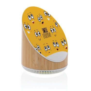 Logo trade reklaamtooted foto: Ovate bambusest 5W kõlar koos 15W juhtmevaba laadijaga