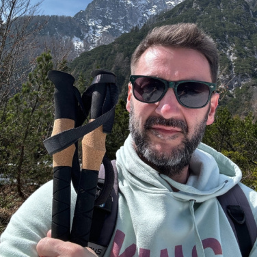 Logo trade firmakingituse pilt: Trekikepid DENALI Schwarzwolf