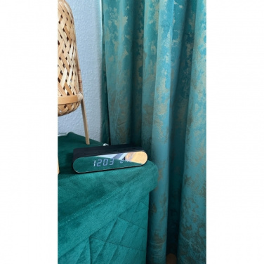 Logo trade meened foto: Äratuskell ja juhtmevaba laadija ADELAIDE